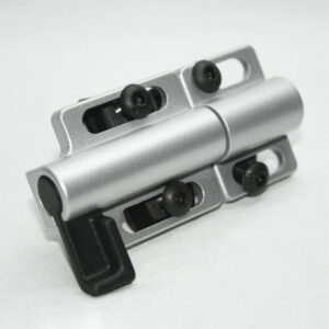 10AC7762_15AC8762_6__edited_e313dfdc-0646-44ac-9e7d-4be7327378ddjpg | Faztek Industrial Solutions Close-up of a small silver metal clamp with a cylindrical bar and black adjustment screws, resting on a light surface.