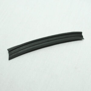 Curved black rubber seal or trim strip with grooves on a white background