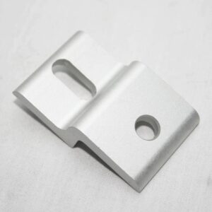 Silver metal mounting bracket with a curved slot and a through-hole for screws