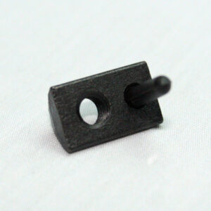 Small black plastic mounting block with a protruding pin and two holes.