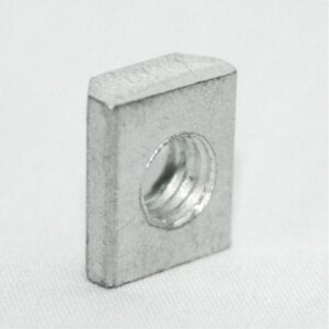 Square metal nut with a threaded hole, standing on edge on a white background.