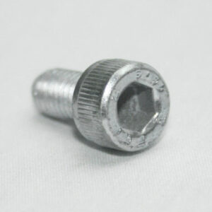 13MFA3600_2__editedjpg | Faztek Industrial Solutions Close-up of a silver hex socket cap screw lying on a white surface.