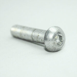 13MFA3656_2__editedjpg | Faztek Industrial Solutions Close-up of a silver hex socket head bolt resting on a white surface, showing its threaded shaft and recessed drive.