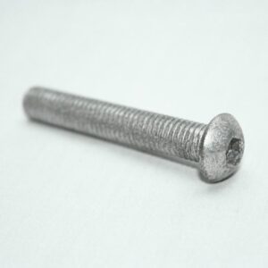 13MFA3657_2__editedjpg | Faztek Industrial Solutions Metal bolt with a hex socket head lying on a white surface.