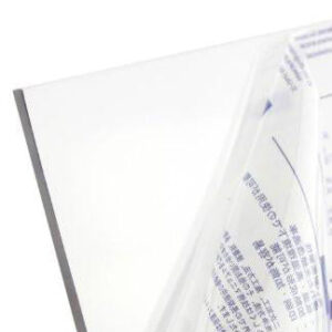 Close-up of a page being turned in a book or magazine, with blank left page and text visible on the right edge.