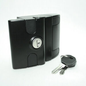 15AC7966_3b__editedjpg | Faztek Industrial Solutions Black rectangular lock housing with a silver keyhole, placed on a white surface beside a set of keys on a keyring.
