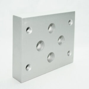 Silver square metal plate with multiple round holes, including a central large hole and several smaller threaded holes around it