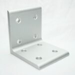 Silver L-shaped metal mounting bracket with several screw holes on both faces, used for joining two surfaces.
