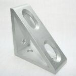Silver metal mounting bracket with triangular profile and three circular holes (two large, one small). - Informative hardware part centerpiece.