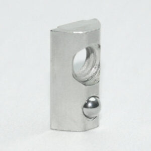 Silver metal rectangular bracket with a circular through-hole near the top and a small shiny ball protruding from the bottom edge
