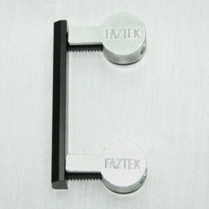 15FAC3884_8__editedjpg | Faztek Industrial Solutions Dual silver clamp handles labeled 'FAZTEK' grip a thin black bar between them, forming a small clamping tool.