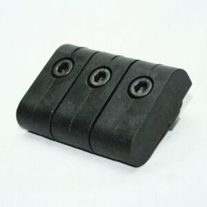 Black curved mounting block with three countersunk hex-socket screws, likely a rail adapter piece.