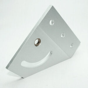 Silver metal mounting bracket with multiple holes and a curved crescent slot, angled diagonally toward the camera.