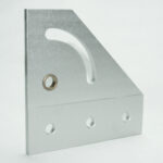 Silver metal mounting bracket with a curved cutout and three bottom holes.