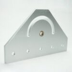 Silver metal triangular mounting bracket with a curved handle cutout and five holes along the bottom edge for mounting.