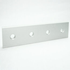 15JP4503_3__editedjpg | Faztek Industrial Solutions Silver aluminum strip with four evenly spaced circular holes resting on a white surface.