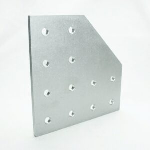 Silver perforated metal plate with multiple round holes arranged in a grid pattern on a flat surface.