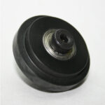 Black metal pulley wheel with silver bearing and knurled central hub on a white background.
