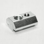 Small silver metal mounting adapter with a threaded hole and a rounded ball on top, on a white background.