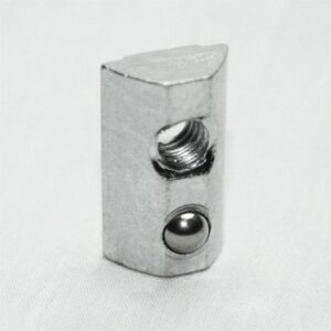 Small silver metal block with a threaded hole on top and a round bore with a ball inside, set against a white background.