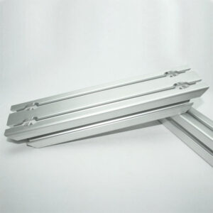 Pair of shiny silver aluminum drawer slides extended on a white surface.
