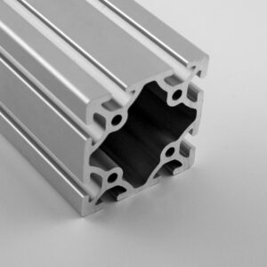 Cross-sectional view of a silver aluminum extrusion with multiple internal channels for modular framing (T-slot profile).