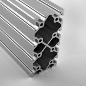 Stack of modular aluminum extrusion profiles with T-slots for framing and assembly.