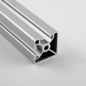 Silver aluminum extrusion/profile with T-slot channels (modular framing rail) typical for CNC machines or framing systems, shown in cross-section view.