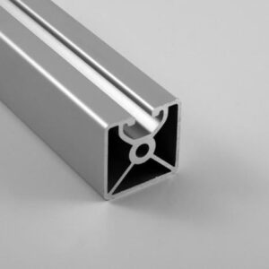 Close-up of an extruded aluminum rail/profile with a U-shaped channel and internal cross-bracing, showing a hollow cross-section and a circular node at the center of the web
