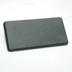 40AC7930_2__editedjpg | Faztek Industrial Solutions Rectangular black plastic object with rounded corners resting on a white surface.