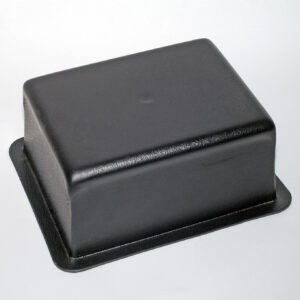 Closed black leather jewelry display box on a white background, angled view